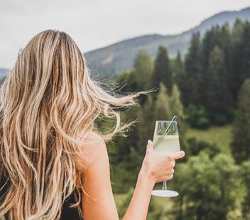 A woman enjoys the vieew from the terrace