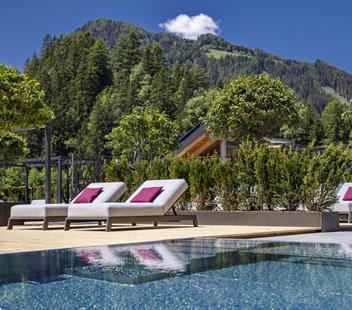 Rooftop terrace with loungers and pool