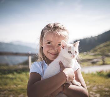 A girl with a cat