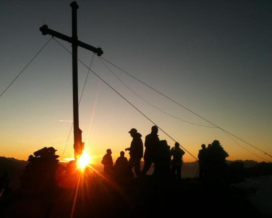 Sunrise at the peak of the mountain