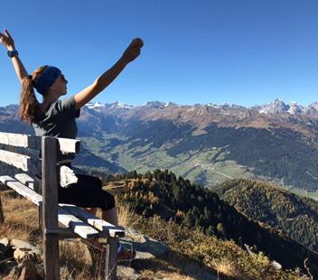 Hannah is taking a break during a hike