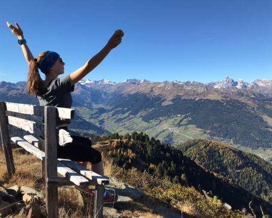 Hannah is taking a break during a hike