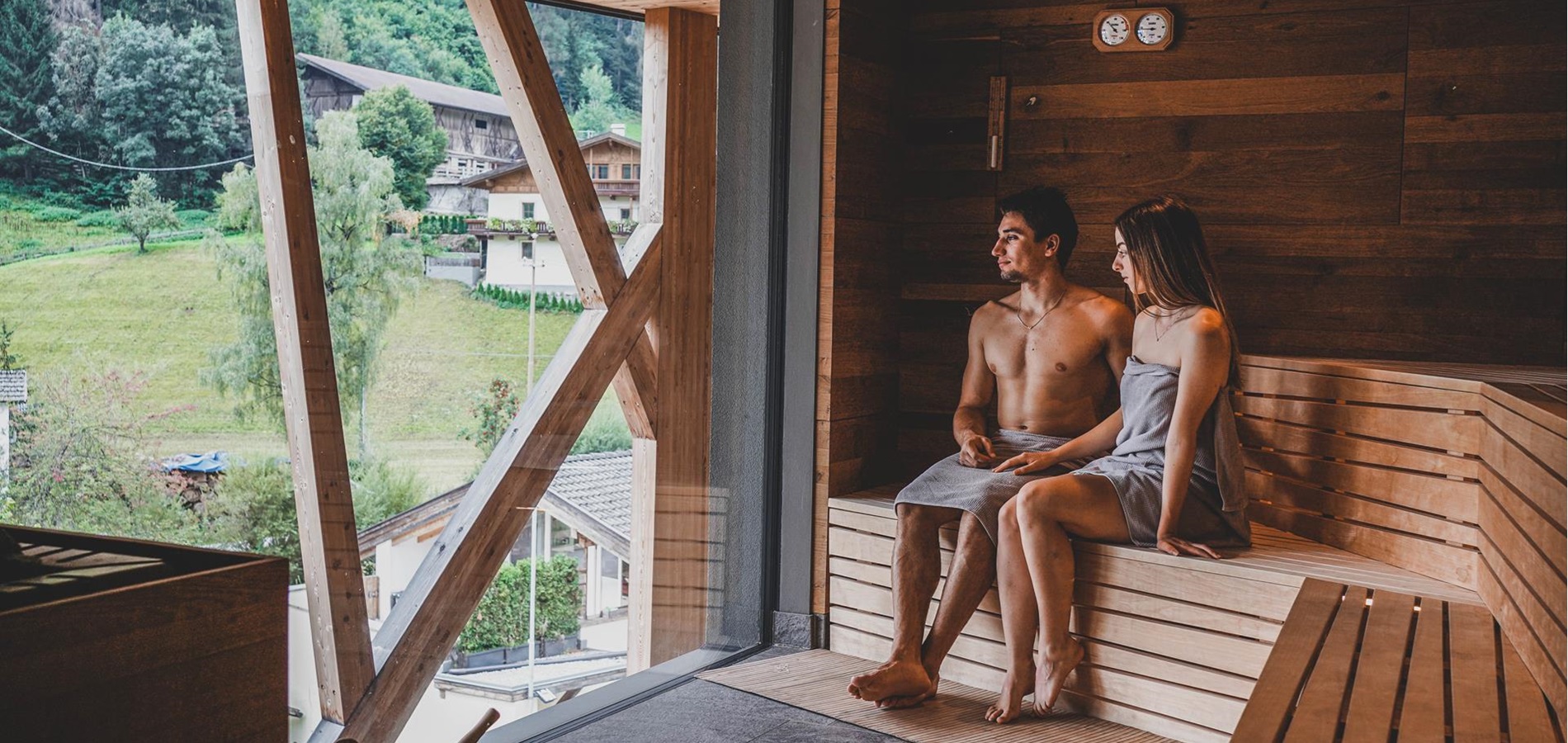 A couple in the panorama sauna