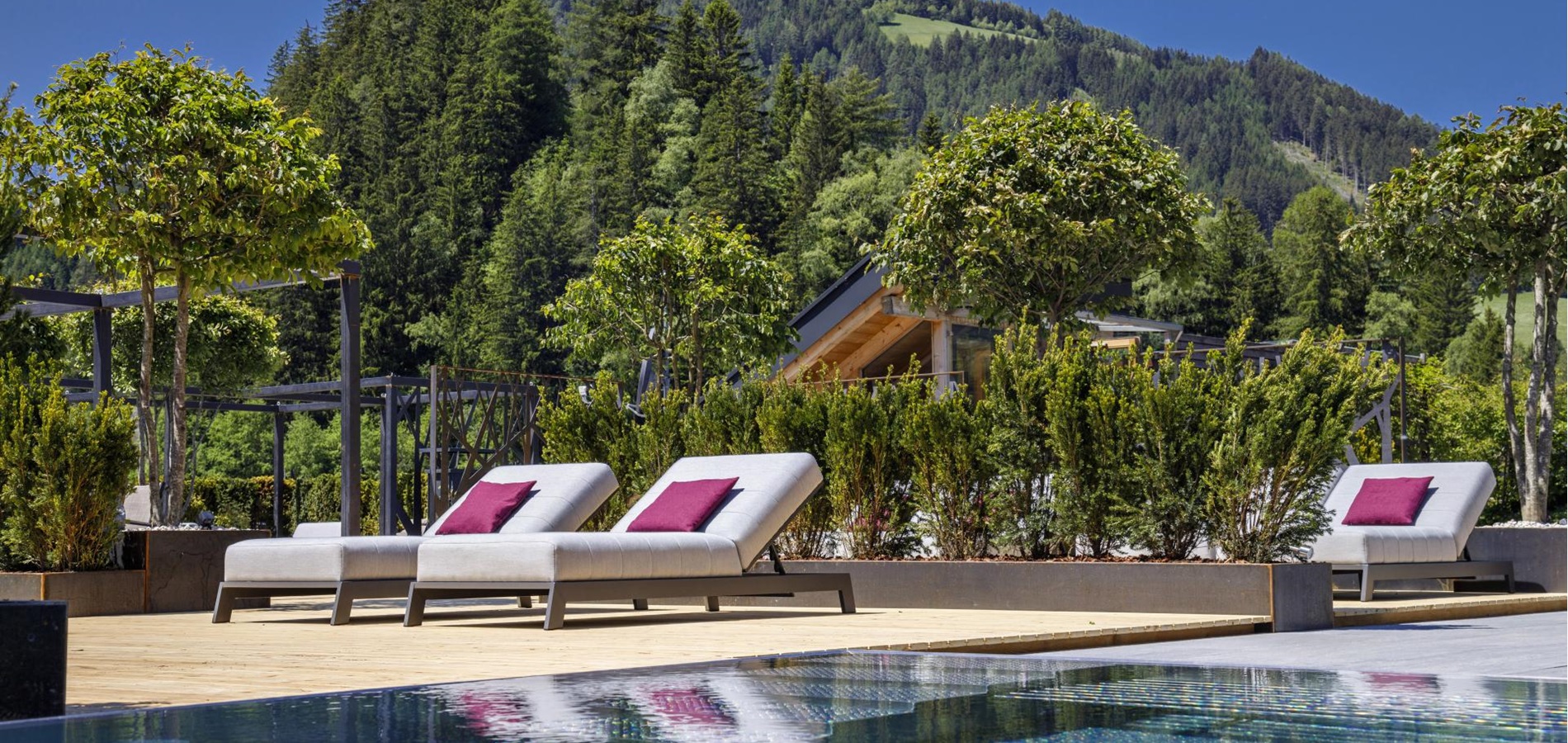 Rooftop terrace with loungers and pool